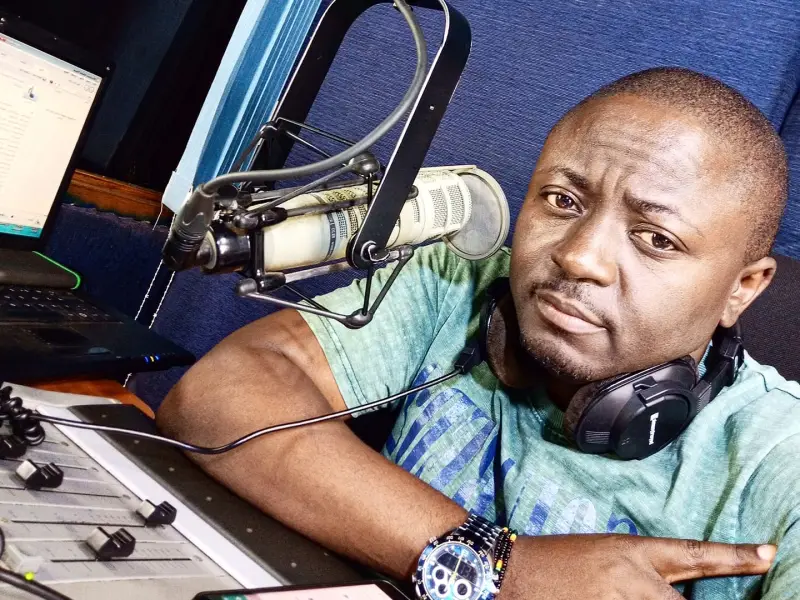 DJ Jacob Omutuuze Begins Cleaning Victoria University Kampala After Losing Bet to Dr Lawrence Muganga
